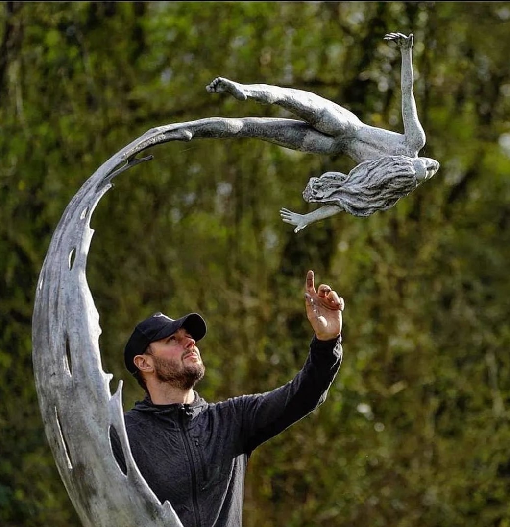 Ian Edwards with one of his figurative bronze sculptures